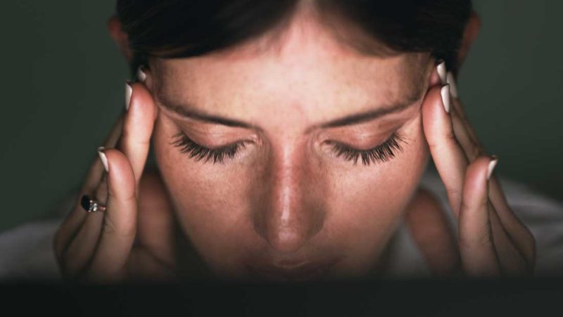 Woman coping with mental stress